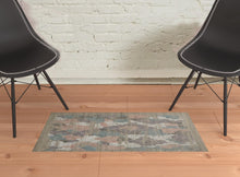 4' X 6' Pink Blue And Taupe Abstract Hand Woven Distressed Area Rug