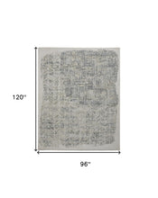 4' X 6' Green Blue And Ivory Abstract Hand Woven Distressed Area Rug