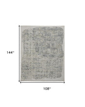 4' X 6' Green Blue And Ivory Abstract Hand Woven Distressed Area Rug