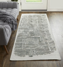 4' X 6' Green Blue And Ivory Abstract Hand Woven Distressed Area Rug