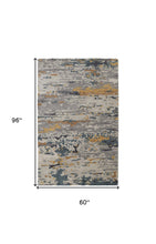 Tan And Blue Wool Abstract Tufted Handmade Stain Resistant Area Rug - 4' x 6'