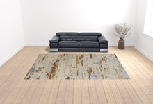 Tan And Blue Wool Abstract Tufted Handmade Stain Resistant Area Rug - 4' x 6'