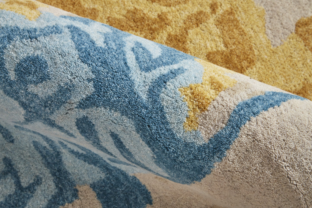 4' X 6' Ivory Yellow And Blue Wool Abstract Tufted Handmade Stain Resistant Area Rug