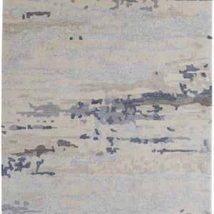 Blue Gray And Ivory Wool Abstract Tufted Handmade Stain Resistant Area Rug - 4' x 6'