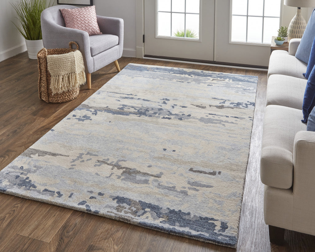 Blue Gray And Ivory Wool Abstract Tufted Handmade Stain Resistant Area Rug - 4' x 6'