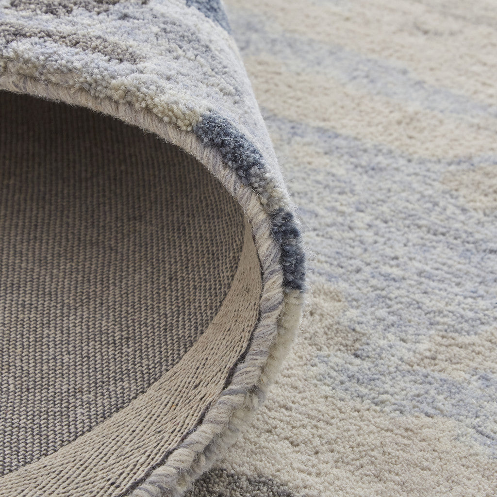 Blue Gray And Ivory Wool Abstract Tufted Handmade Stain Resistant Area Rug - 4' x 6'