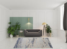 Blue Gray And Ivory Wool Abstract Tufted Handmade Stain Resistant Area Rug - 4' x 6'