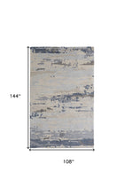 Blue Gray And Ivory Wool Abstract Tufted Handmade Stain Resistant Area Rug - 4' x 6'