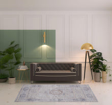 4' X 6' Gray And Ivory Floral Power Loom Distressed Stain Resistant Area Rug