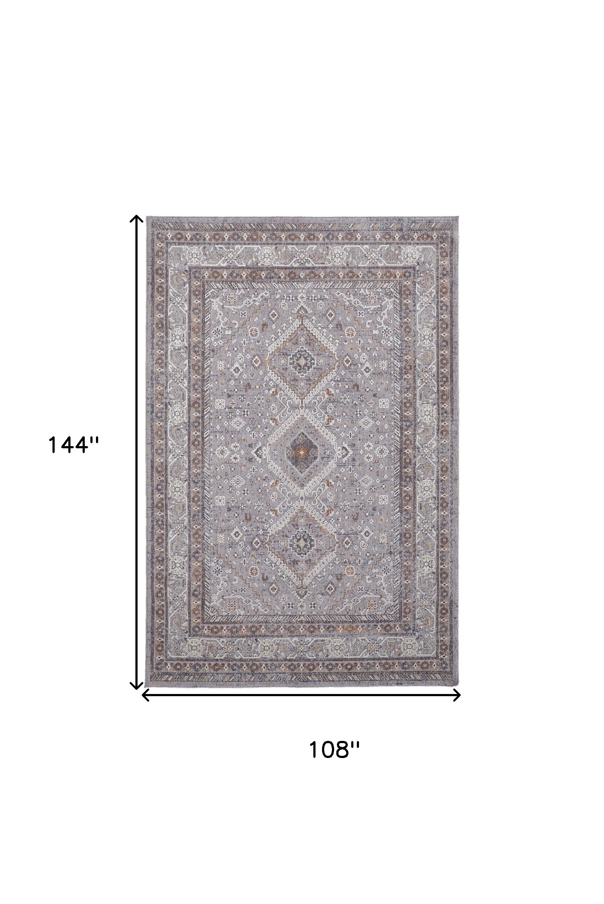 4' X 6' Gray Orange And Ivory Floral Power Loom Stain Resistant Area Rug