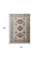 5' X 8' Gray Brown And Blue Floral Stain Resistant Area Rug