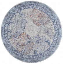 5' X 8' Blue Ivory And Red Floral Power Loom Distressed Stain Resistant Area Rug