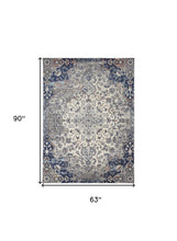 5' X 8' Ivory Gray And Blue Floral Power Loom Distressed Stain Resistant Area Rug