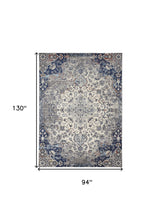 5' X 8' Ivory Gray And Blue Floral Power Loom Distressed Stain Resistant Area Rug