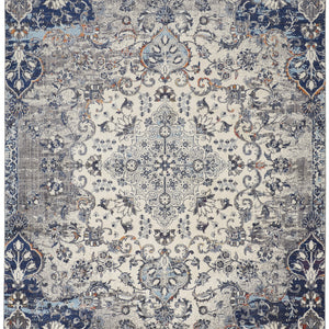 5' X 8' Ivory Gray And Blue Floral Power Loom Distressed Stain Resistant Area Rug
