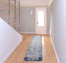 5' X 8' Ivory Gray And Blue Floral Power Loom Distressed Stain Resistant Area Rug