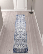 5' X 8' Ivory Gray And Blue Floral Power Loom Distressed Stain Resistant Area Rug