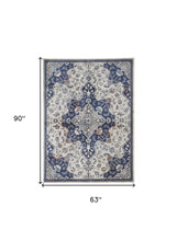 5' X 8' Gray Ivory And Blue Floral Power Loom Distressed Stain Resistant Area Rug