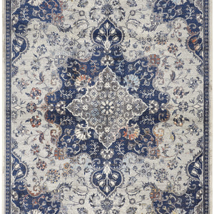 5' X 8' Gray Ivory And Blue Floral Power Loom Distressed Stain Resistant Area Rug