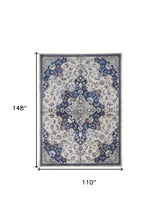 5' X 8' Gray Ivory And Blue Floral Power Loom Distressed Stain Resistant Area Rug