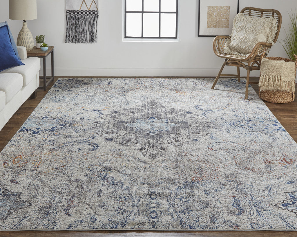 5' X 8' Ivory Taupe And Blue Floral Power Loom Distressed Stain Resistant Area Rug