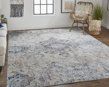 5' X 8' Ivory Taupe And Blue Floral Power Loom Distressed Stain Resistant Area Rug