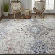5' X 8' Ivory Taupe And Blue Floral Power Loom Distressed Stain Resistant Area Rug