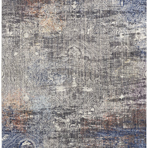 5' X 8' Taupe Blue And Ivory Abstract Power Loom Distressed Stain Resistant Area Rug