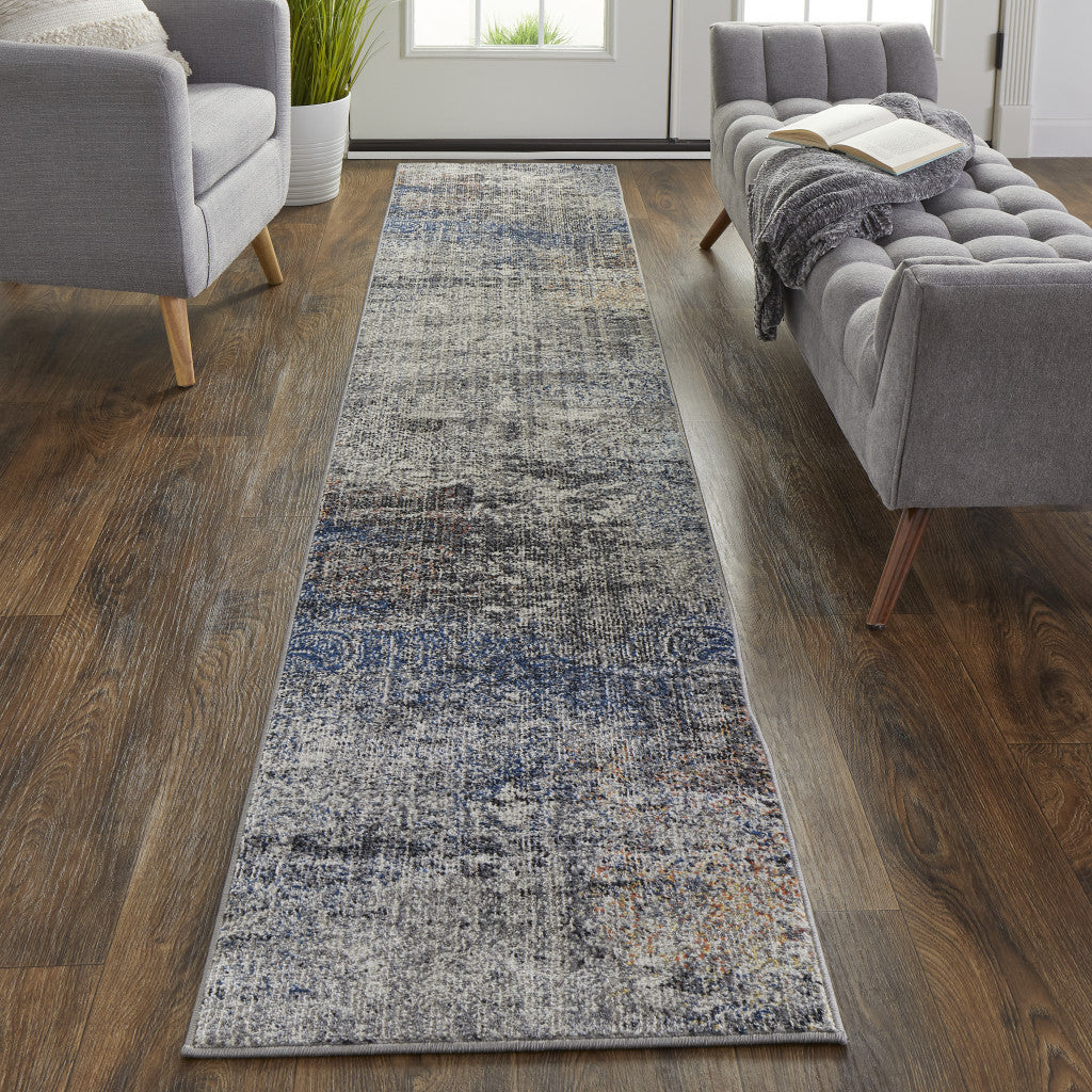 5' X 8' Taupe Blue And Ivory Abstract Power Loom Distressed Stain Resistant Area Rug