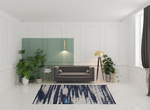 4' X 6' Ivory Blue And Gray Abstract Power Loom Distressed Area Rug