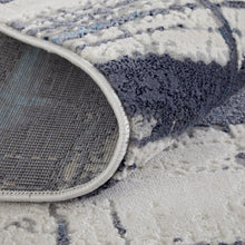 4' X 6' Ivory Blue And Gray Abstract Power Loom Distressed Area Rug