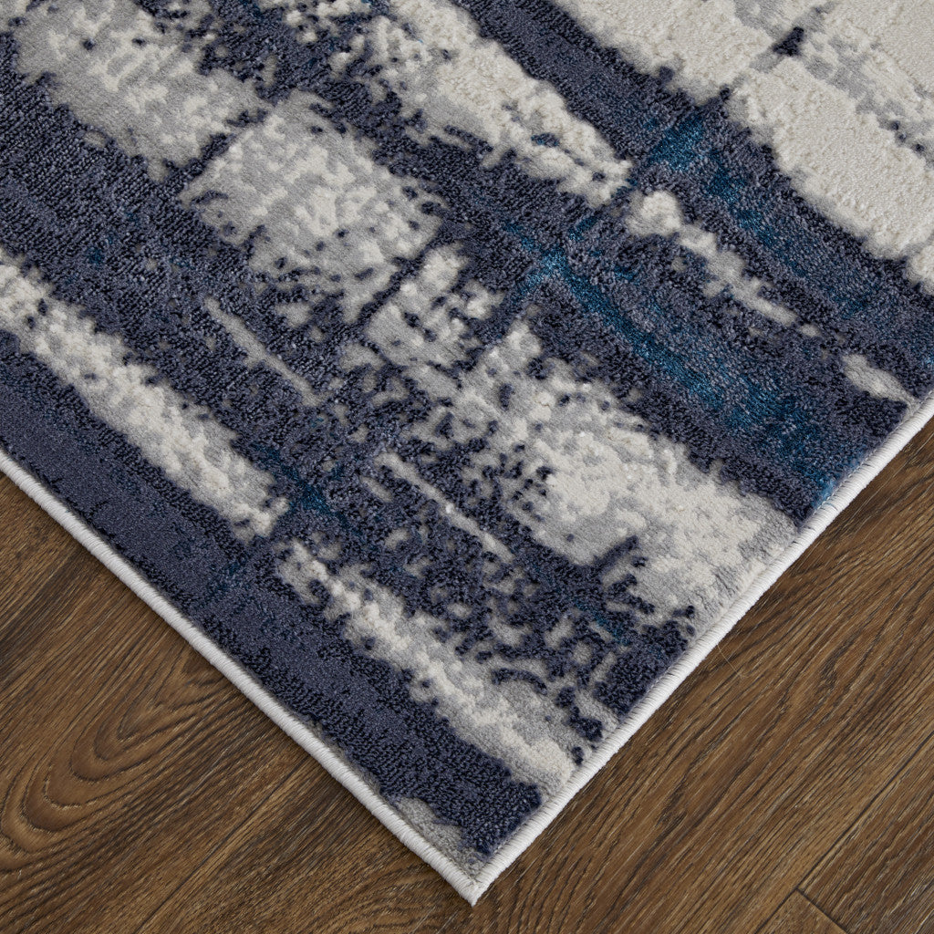 4' X 6' Ivory Blue And Gray Abstract Power Loom Distressed Area Rug