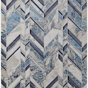10' X 13' Ivory Blue And Gray Chevron Power Loom Distressed Area Rug