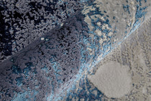 4' X 6' Ivory Blue And Black Abstract Power Loom Distressed Area Rug