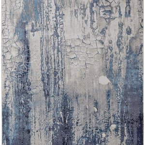 4' X 6' Ivory Blue And Black Abstract Power Loom Distressed Area Rug