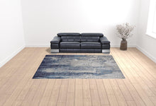 4' X 6' Ivory Blue And Black Abstract Power Loom Distressed Area Rug