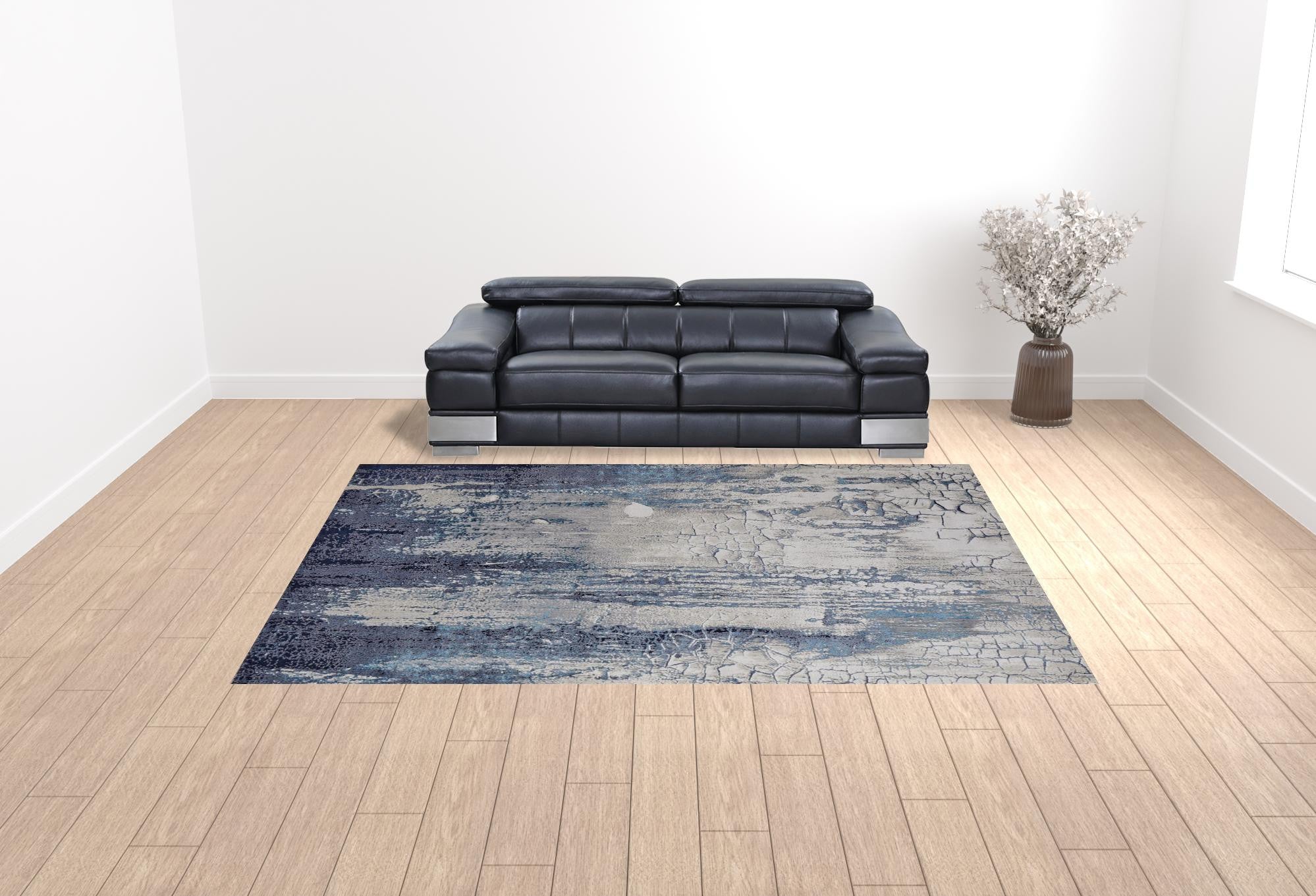 4' X 6' Ivory Blue And Black Abstract Power Loom Distressed Area Rug