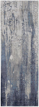 4' X 6' Ivory Blue And Black Abstract Power Loom Distressed Area Rug