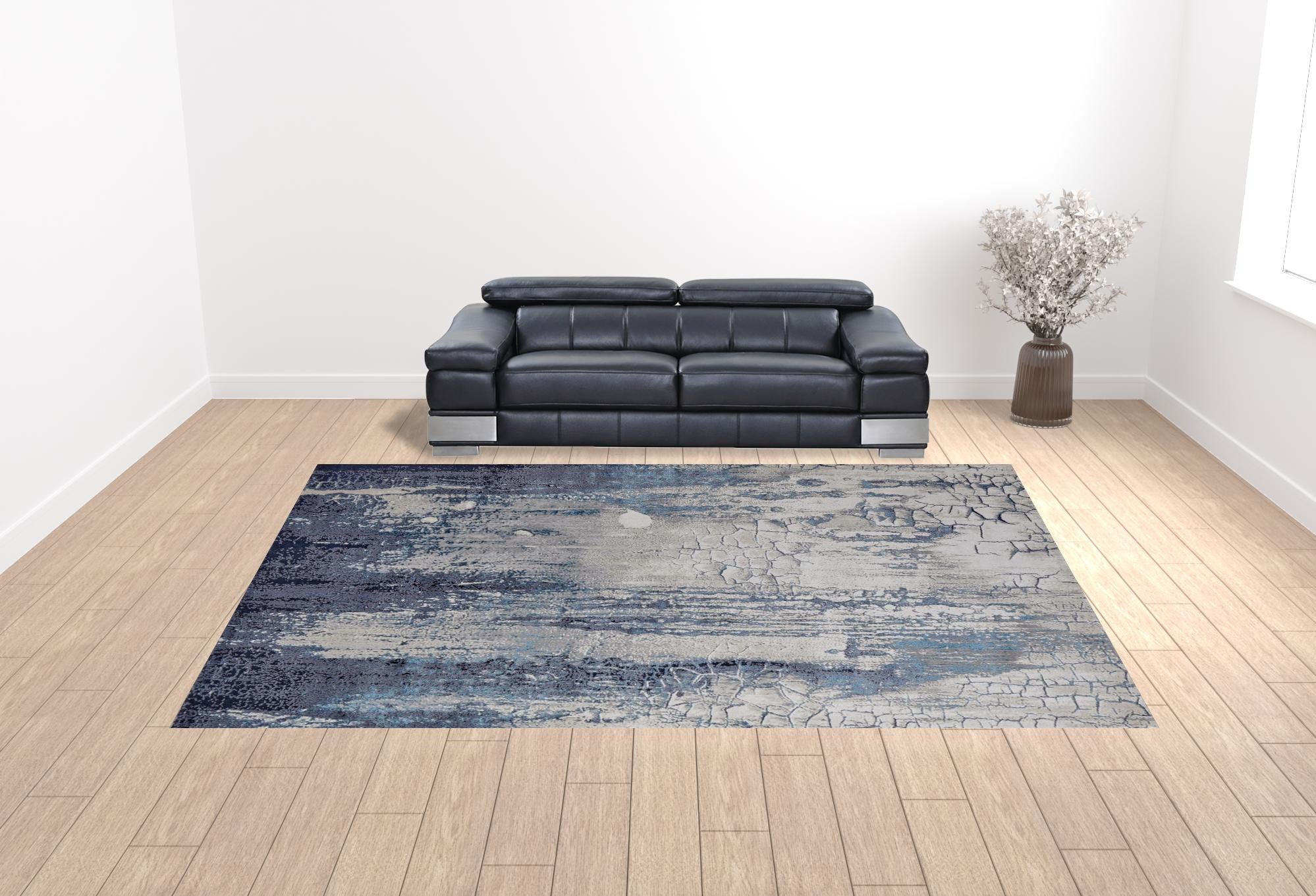 4' X 6' Ivory Blue And Black Abstract Power Loom Distressed Area Rug