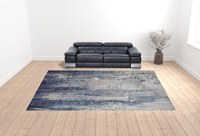 4' X 6' Ivory Blue And Black Abstract Power Loom Distressed Area Rug