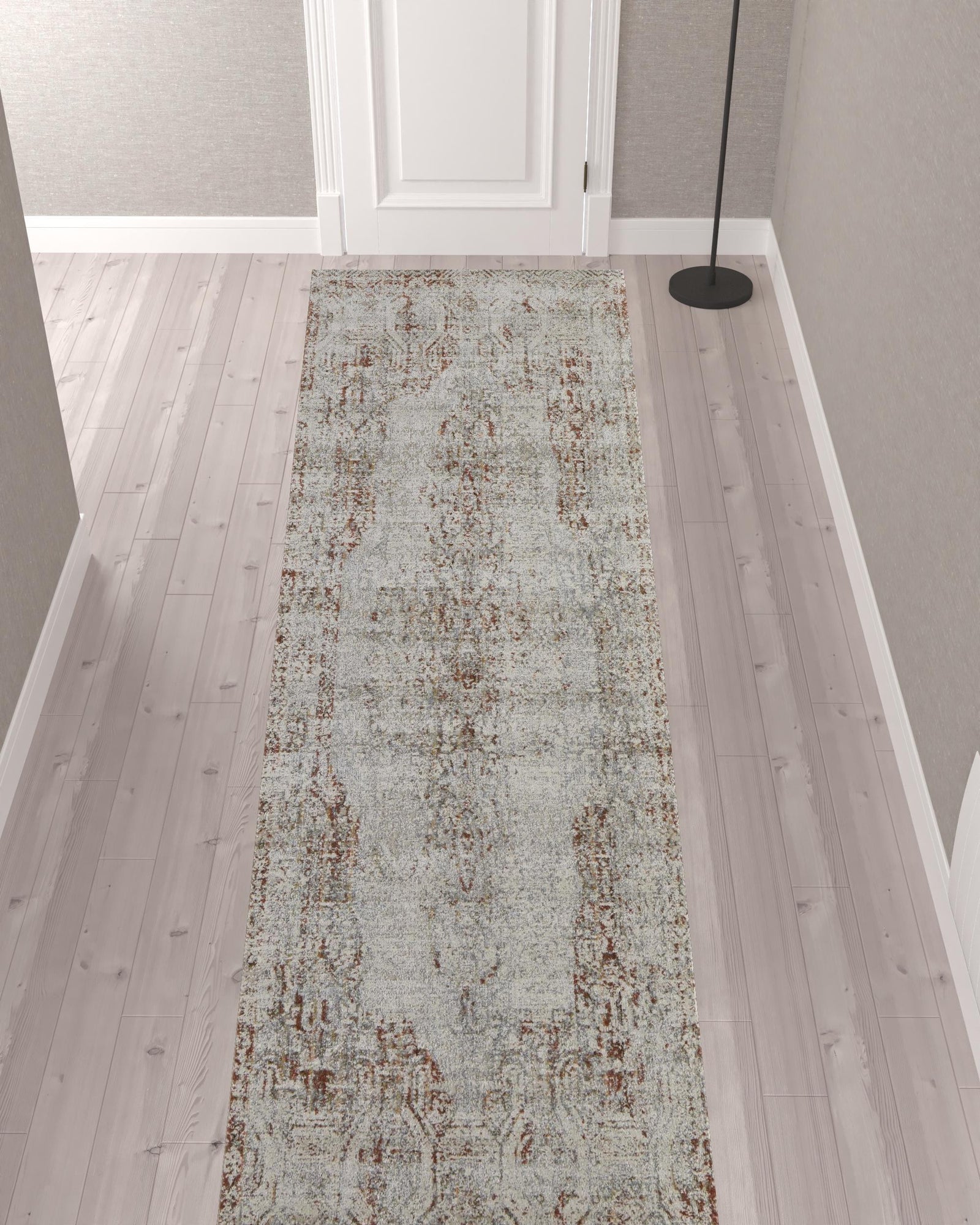 5' X 8' Tan Ivory And Orange Floral Power Loom Distressed Area Rug With Fringe