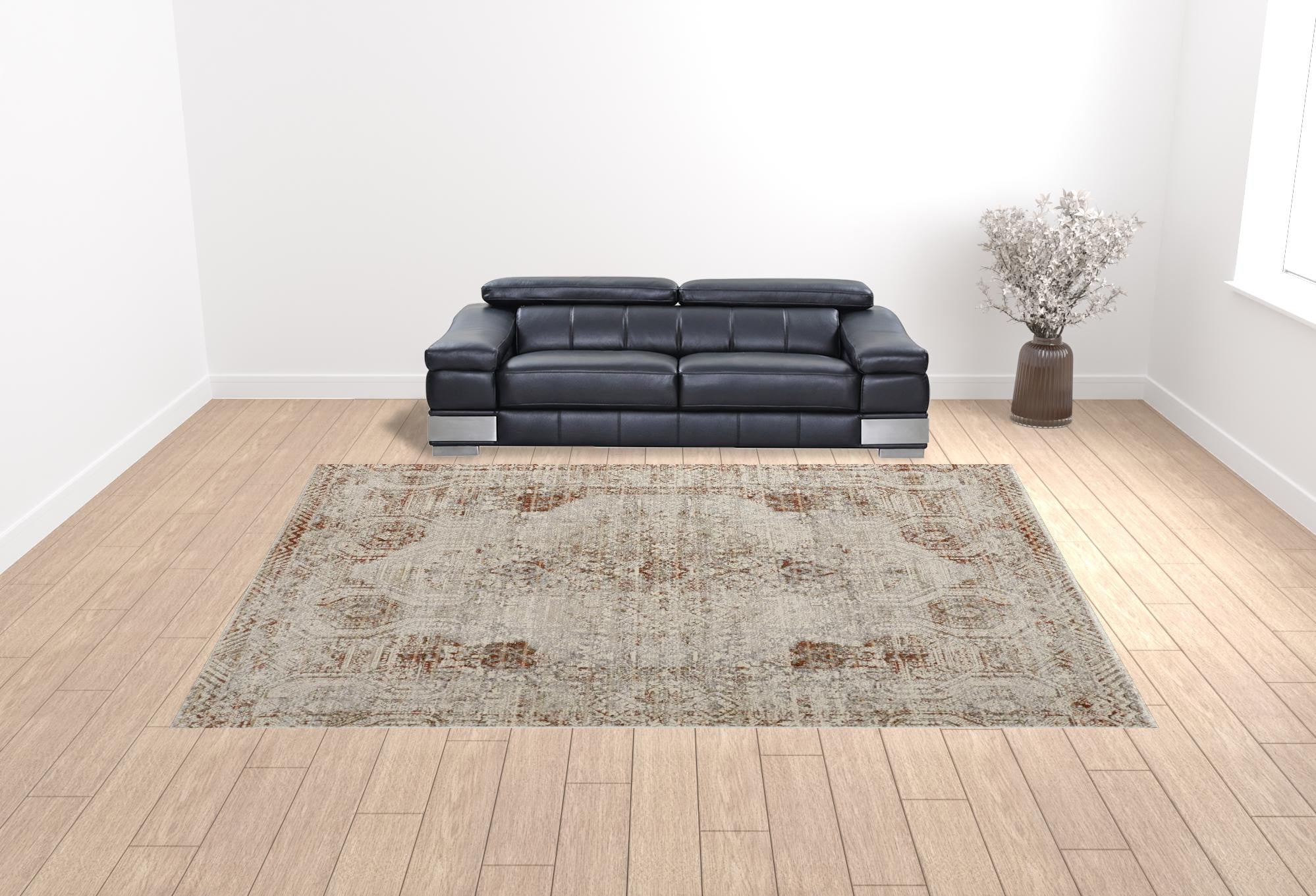 5' X 8' Tan Ivory And Orange Floral Power Loom Distressed Area Rug With Fringe