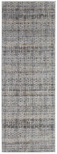 5' X 8' Tan Ivory And Blue Geometric Power Loom Distressed Area Rug With Fringe