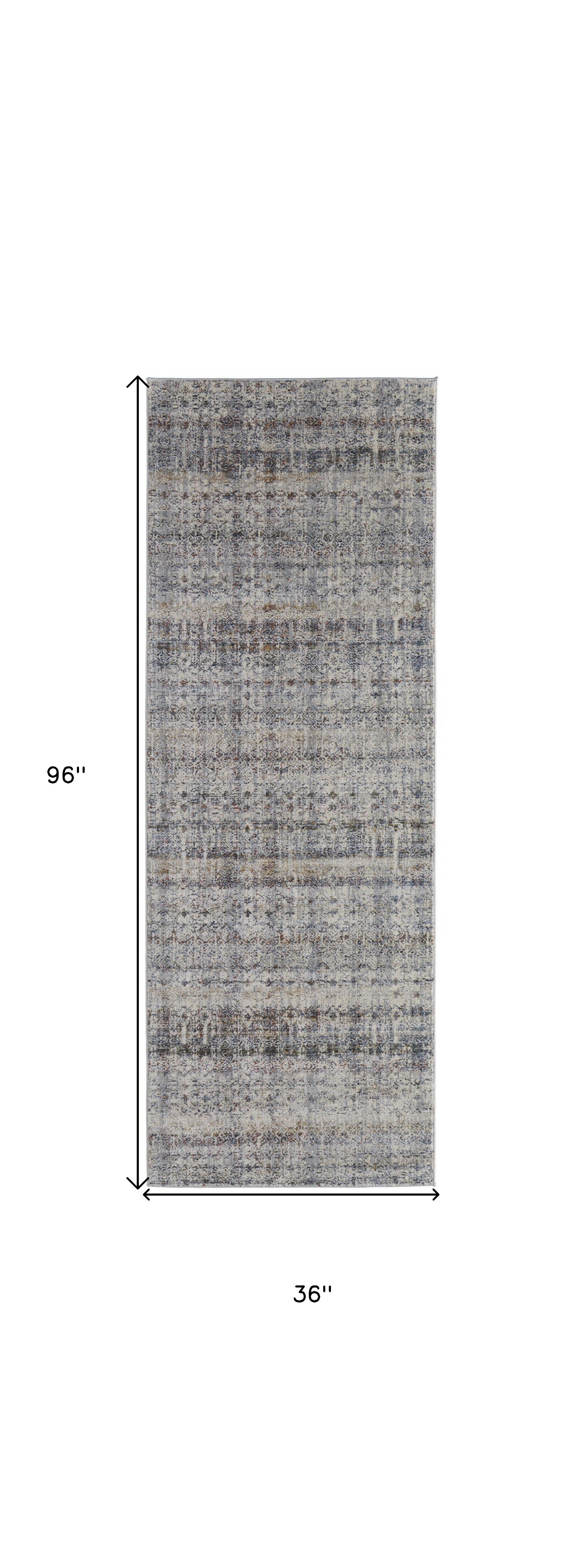 5' X 8' Tan Ivory And Blue Geometric Power Loom Distressed Area Rug With Fringe