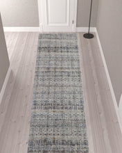 5' X 8' Tan Ivory And Blue Geometric Power Loom Distressed Area Rug With Fringe