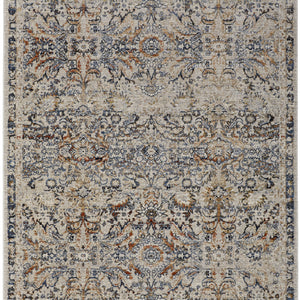 5' X 8' Tan Blue And Orange Floral Power Loom Distressed Area Rug With Fringe