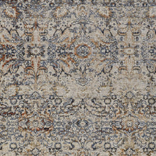 5' X 8' Tan Blue And Orange Floral Power Loom Distressed Area Rug With Fringe