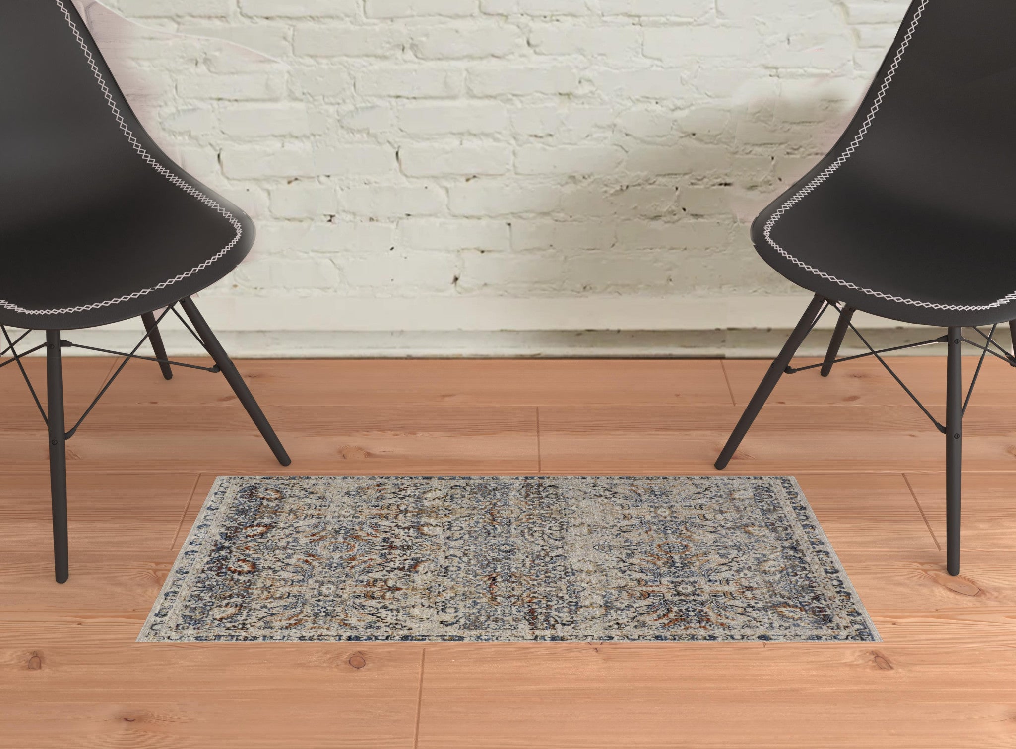 5' X 8' Tan Blue And Orange Floral Power Loom Distressed Area Rug With Fringe