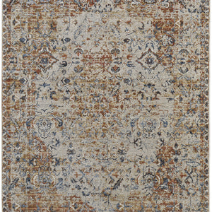 5' X 8' Tan Ivory And Orange Floral Power Loom Area Rug With Fringe