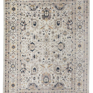 4' X 6' Tan Ivory And Blue Floral Stain Resistant Area Rug